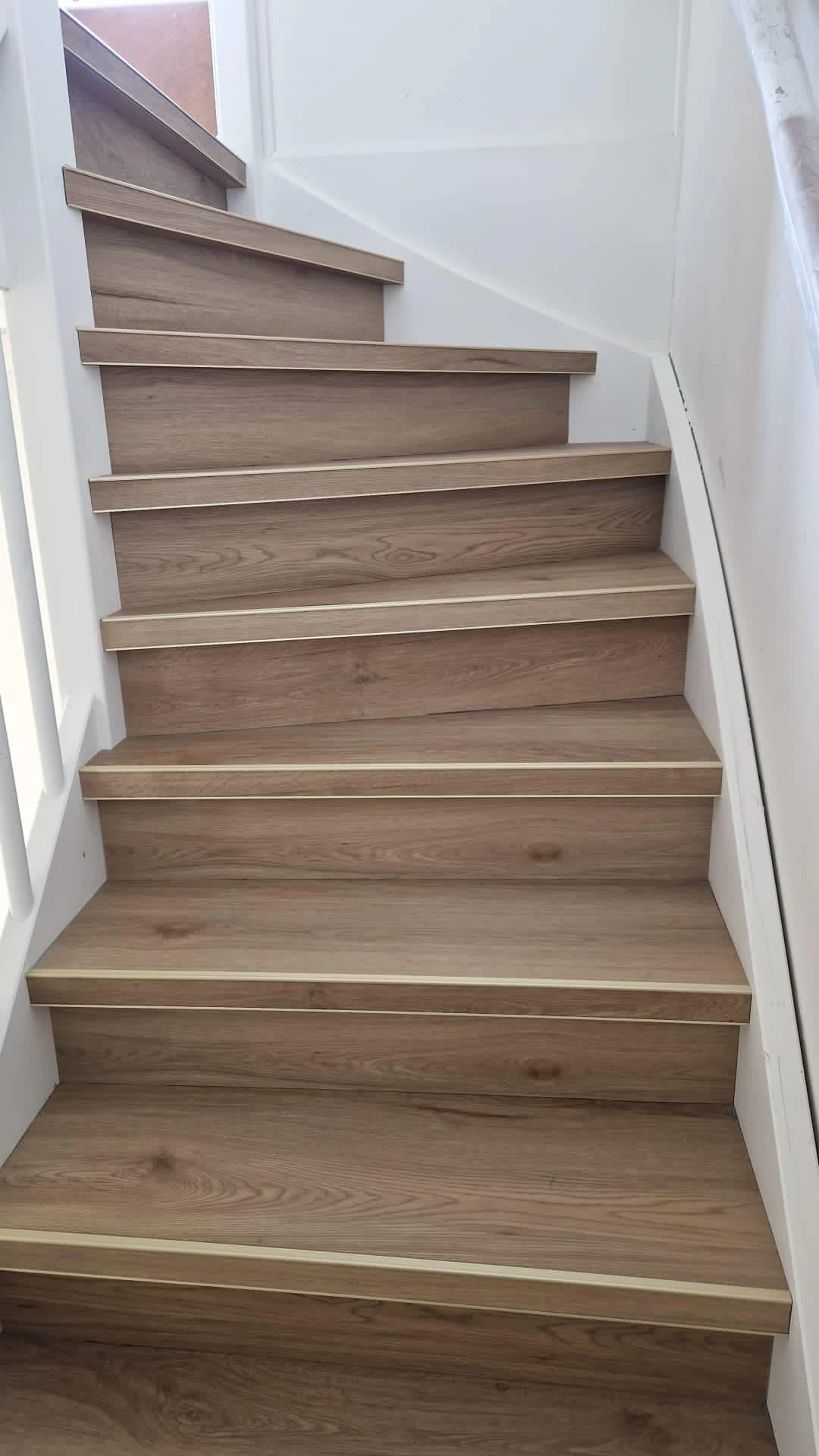 Pvc trap met goudkleurige strip